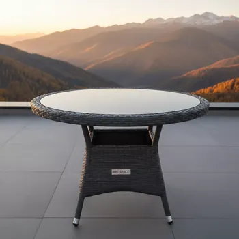 Аренда Стол круглый плетеный YH T1661G 1 graphite на площадке Rosa Peak (2320м) — ART SPACE